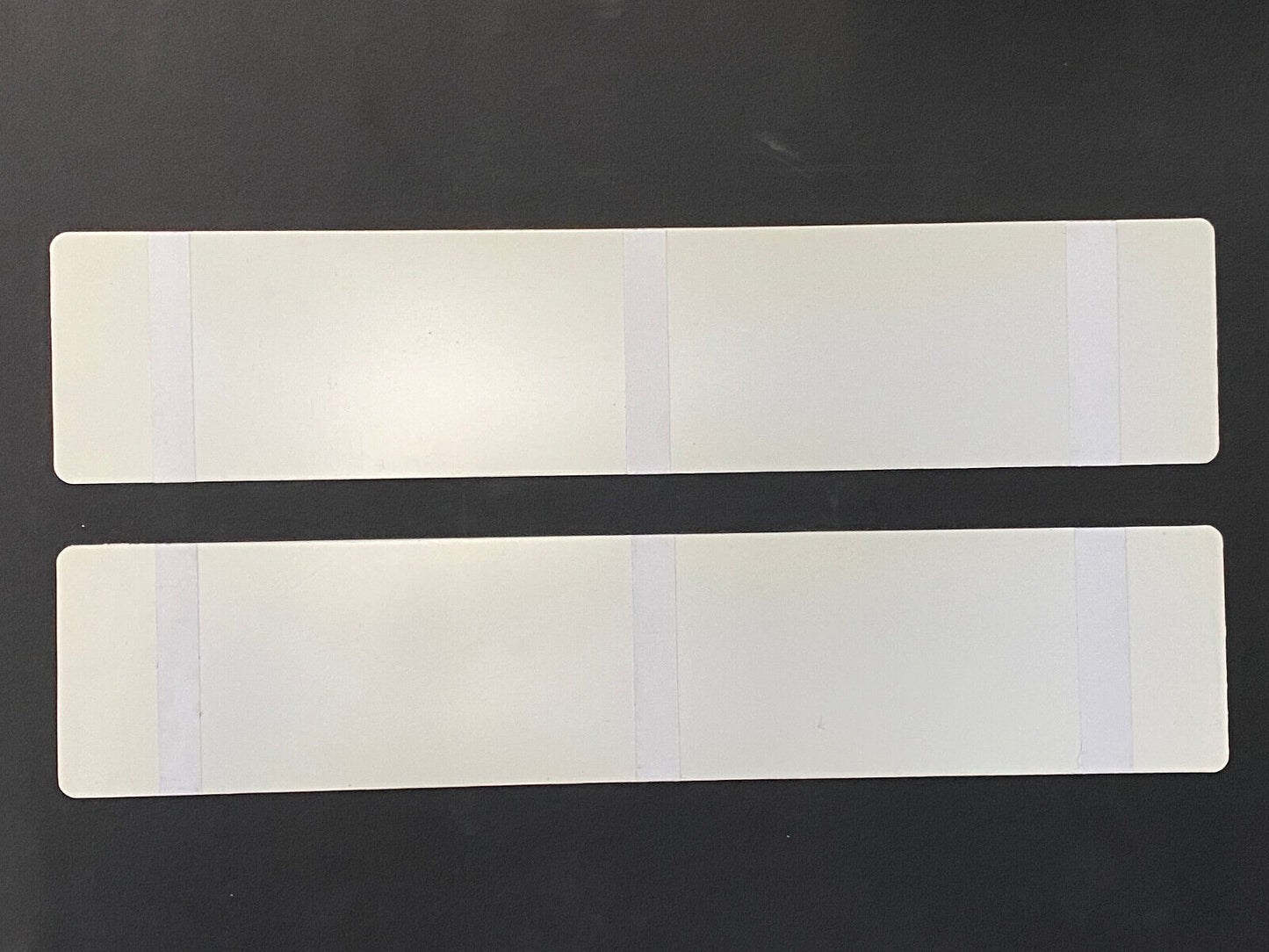 1 Paar original VW Scirocco Kennzeichenschild Kennzeicheneinleger Silber/Schwarz