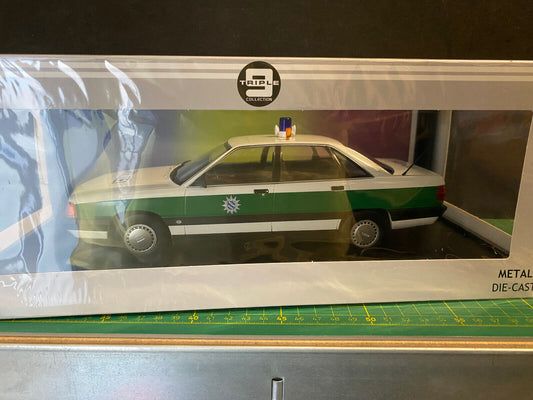 Audi 100 Polizei Triple9 T9-1800354 Neu in OVP new in box 1:18