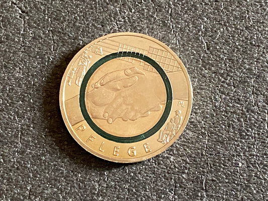 10 EURO 2022 "Pflege" durchsichtiger Polymerring Prägestätte G