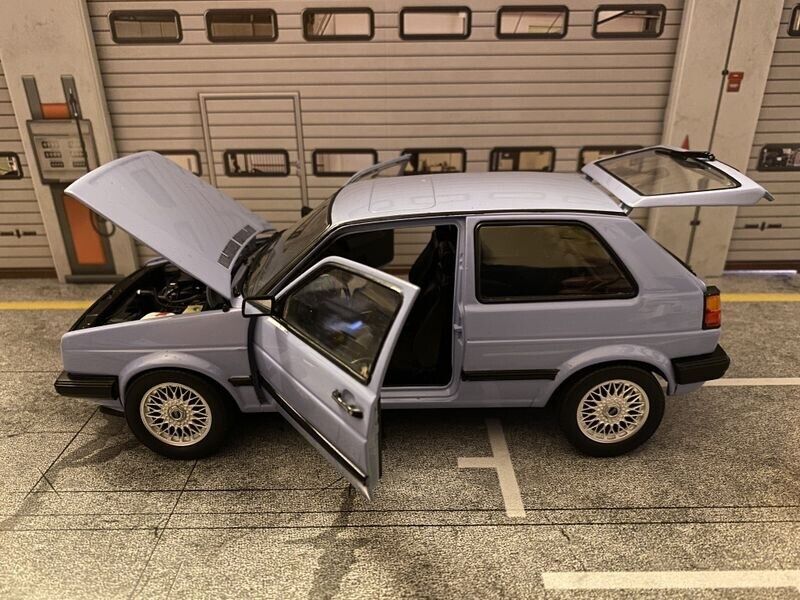 VW Golf 19E 2-Türer in Taubenblau 1 of 1 alles zu öffnen Tuning Umbau 1:18